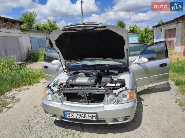 Серый Киа Маджентис, объемом двигателя 2 л и пробегом 362 тыс. км за 2400 $, фото 1 на Automoto.ua