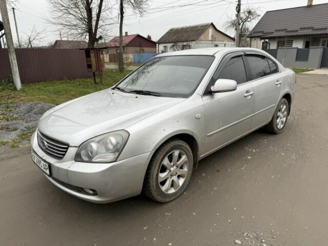 Сірий Кіа Маджентіс, об'ємом двигуна 2 л та пробігом 176 тис. км за 3900 $, фото 1 на Automoto.ua