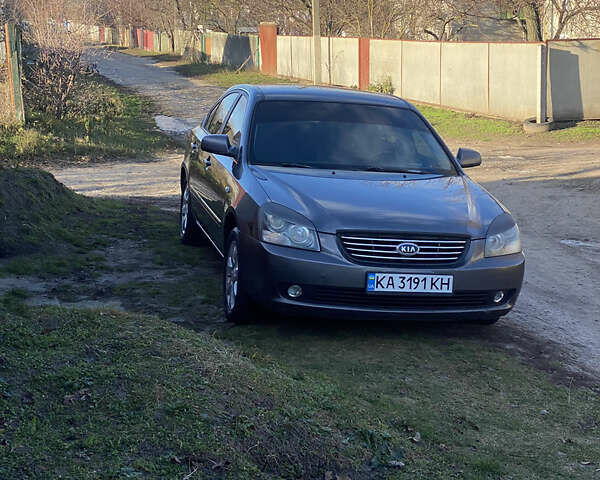 Сірий Кіа Маджентіс, об'ємом двигуна 2 л та пробігом 303 тис. км за 4700 $, фото 1 на Automoto.ua