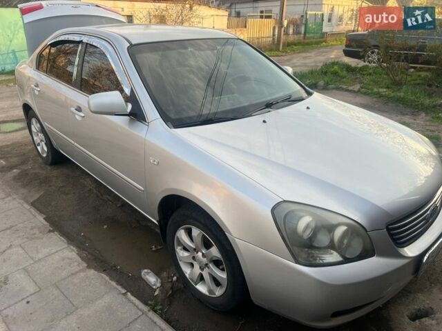 Сірий Кіа Маджентіс, об'ємом двигуна 2 л та пробігом 255 тис. км за 5100 $, фото 1 на Automoto.ua