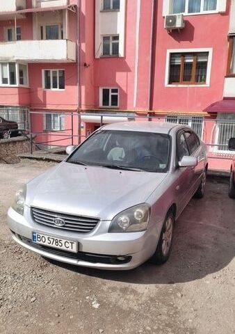 Сірий Кіа Маджентіс, об'ємом двигуна 2 л та пробігом 270 тис. км за 3900 $, фото 1 на Automoto.ua