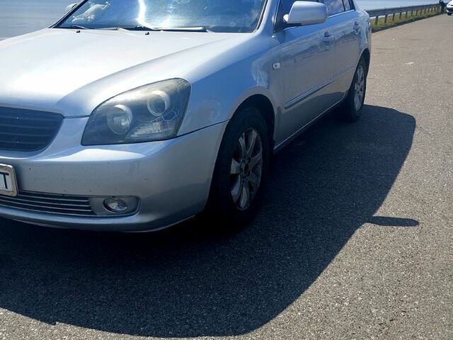 Сірий Кіа Маджентіс, об'ємом двигуна 2 л та пробігом 245 тис. км за 4900 $, фото 1 на Automoto.ua