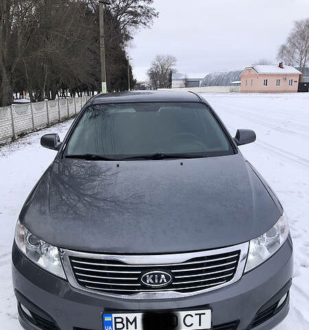 Сірий Кіа Маджентіс, об'ємом двигуна 2 л та пробігом 200 тис. км за 7800 $, фото 1 на Automoto.ua