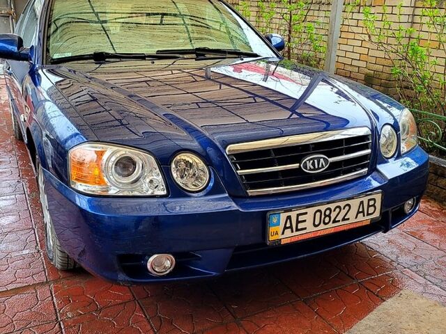 Синій Кіа Маджентіс, об'ємом двигуна 2 л та пробігом 112 тис. км за 4100 $, фото 1 на Automoto.ua