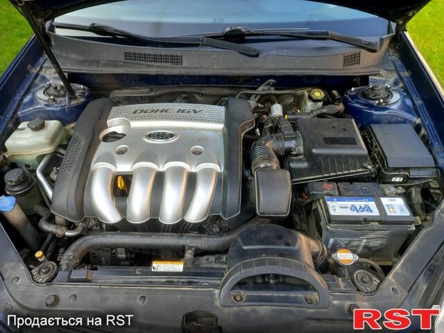 Синий Киа Маджентис, объемом двигателя 2 л и пробегом 320 тыс. км за 5200 $, фото 1 на Automoto.ua