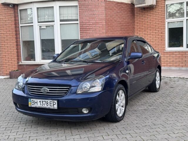 Синій Кіа Маджентіс, об'ємом двигуна 2 л та пробігом 186 тис. км за 5750 $, фото 1 на Automoto.ua