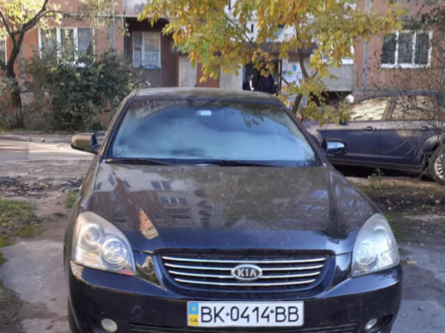 Синій Кіа Маджентіс, об'ємом двигуна 2 л та пробігом 314 тис. км за 4500 $, фото 1 на Automoto.ua