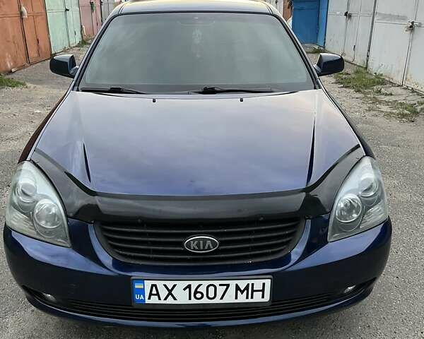Синій Кіа Маджентіс, об'ємом двигуна 2 л та пробігом 320 тис. км за 5100 $, фото 1 на Automoto.ua