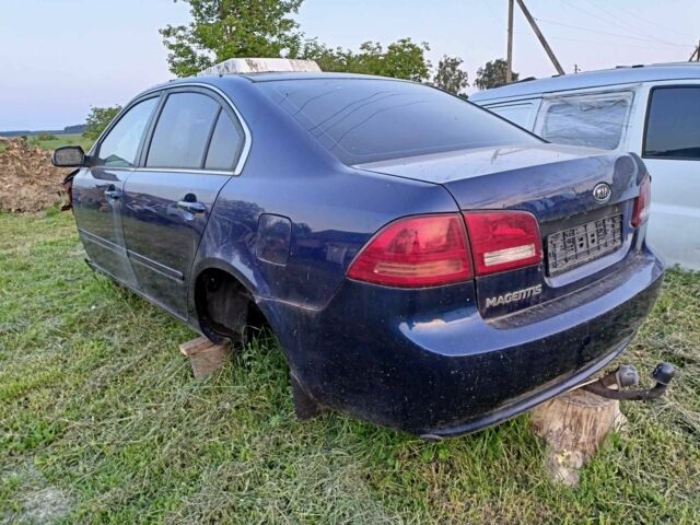 Синій Кіа Маджентіс, об'ємом двигуна 2 л та пробігом 450 тис. км за 1200 $, фото 1 на Automoto.ua