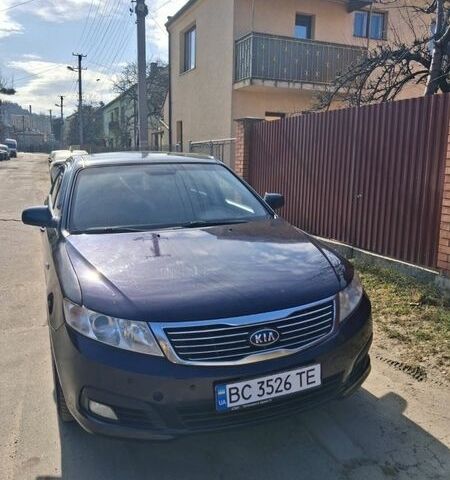 Синій Кіа Маджентіс, об'ємом двигуна 2 л та пробігом 243 тис. км за 6000 $, фото 1 на Automoto.ua