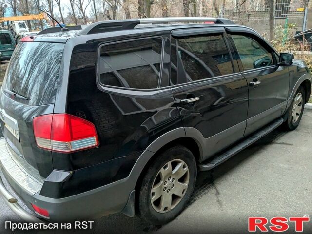 Черный Киа Мохаве, объемом двигателя 30 л и пробегом 301 тыс. км за 10000 $, фото 1 на Automoto.ua
