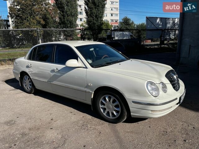 Білий Кіа Опірус, об'ємом двигуна 3 л та пробігом 228 тис. км за 2999 $, фото 1 на Automoto.ua