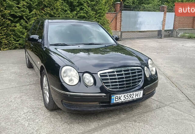 Черный Киа Опирус, объемом двигателя 3.78 л и пробегом 185 тыс. км за 6800 $, фото 1 на Automoto.ua