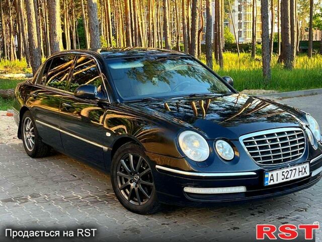 Черный Киа Опирус, объемом двигателя 3.8 л и пробегом 248 тыс. км за 9900 $, фото 1 на Automoto.ua