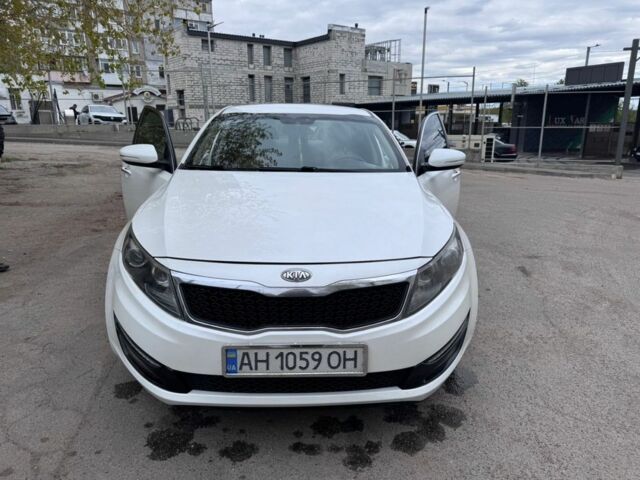 Белый Киа Оптима, объемом двигателя 2 л и пробегом 220 тыс. км за 10400 $, фото 1 на Automoto.ua