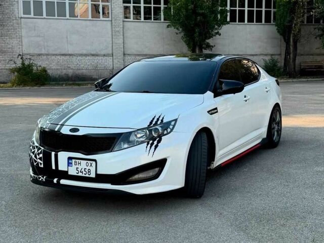 Белый Киа Оптима, объемом двигателя 2 л и пробегом 285 тыс. км за 8700 $, фото 1 на Automoto.ua
