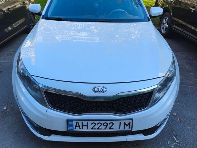 Белый Киа Оптима, объемом двигателя 2 л и пробегом 333 тыс. км за 8500 $, фото 1 на Automoto.ua
