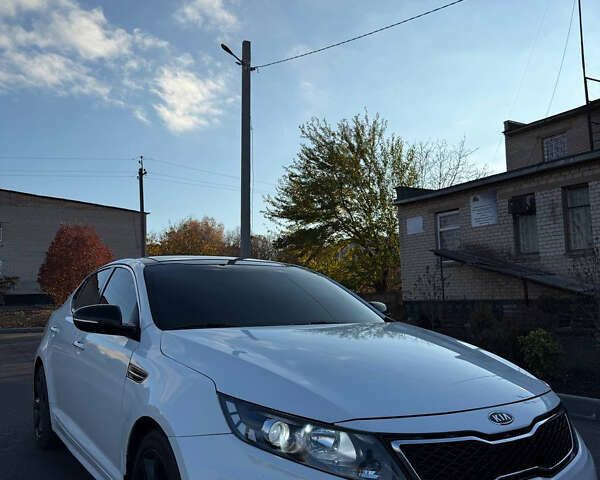 Белый Киа Оптима, объемом двигателя 2 л и пробегом 125 тыс. км за 9400 $, фото 1 на Automoto.ua