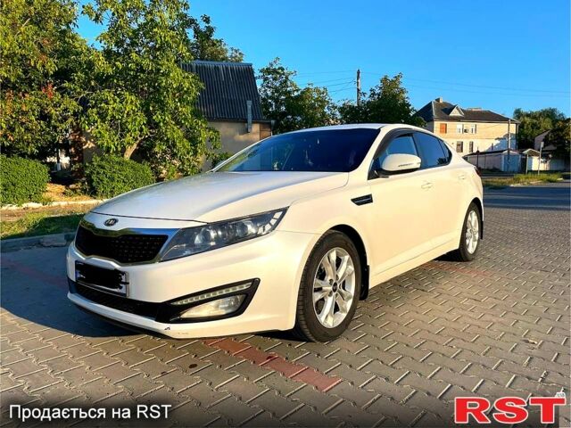 Білий Кіа Оптіма, об'ємом двигуна 2 л та пробігом 177 тис. км за 9300 $, фото 1 на Automoto.ua
