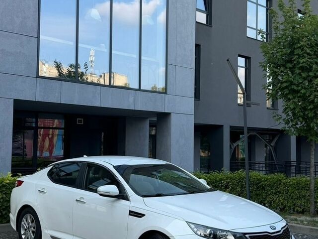 Білий Кіа Оптіма, об'ємом двигуна 2.36 л та пробігом 140 тис. км за 7500 $, фото 1 на Automoto.ua