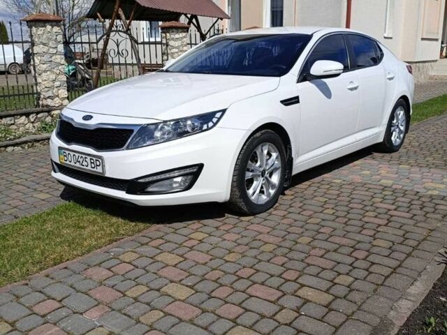 Белый Киа Оптима, объемом двигателя 2 л и пробегом 195 тыс. км за 10350 $, фото 1 на Automoto.ua