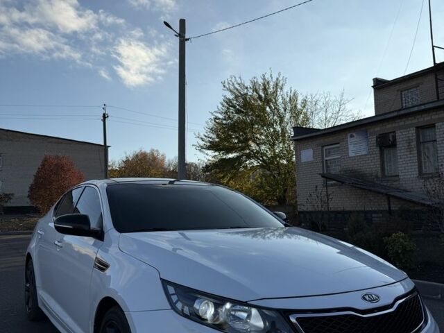 Белый Киа Оптима, объемом двигателя 2 л и пробегом 125 тыс. км за 9400 $, фото 1 на Automoto.ua