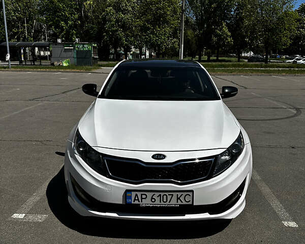 Белый Киа Оптима, объемом двигателя 2 л и пробегом 190 тыс. км за 9000 $, фото 1 на Automoto.ua