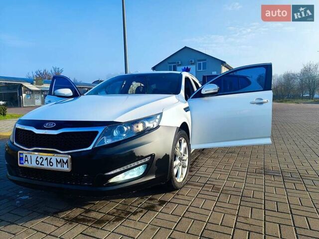 Белый Киа Оптима, объемом двигателя 2 л и пробегом 173 тыс. км за 6500 $, фото 1 на Automoto.ua