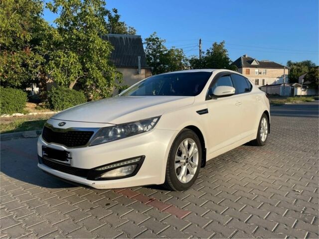 Белый Киа Оптима, объемом двигателя 2 л и пробегом 177 тыс. км за 9300 $, фото 1 на Automoto.ua