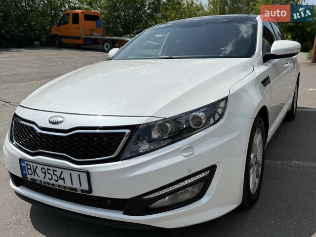 Белый Киа Оптима, объемом двигателя 1.69 л и пробегом 241 тыс. км за 12950 $, фото 1 на Automoto.ua