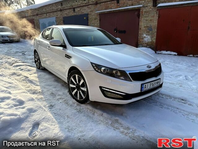 Білий Кіа Оптіма, об'ємом двигуна 2 л та пробігом 21000 тис. км за 9500 $, фото 1 на Automoto.ua