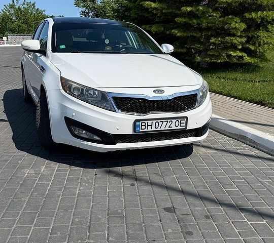 Белый Киа Оптима, объемом двигателя 2.36 л и пробегом 221 тыс. км за 9300 $, фото 1 на Automoto.ua