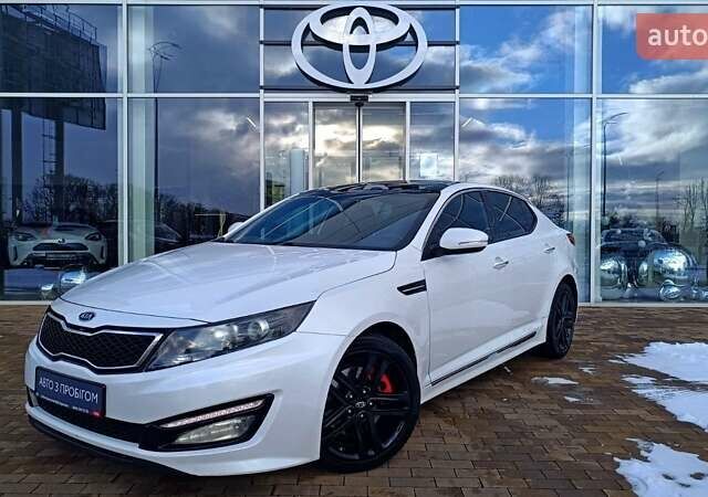 Білий Кіа Оптіма, об'ємом двигуна 2 л та пробігом 161 тис. км за 8994 $, фото 1 на Automoto.ua
