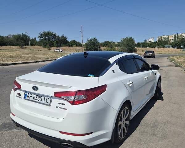Белый Киа Оптима, объемом двигателя 2 л и пробегом 85 тыс. км за 12500 $, фото 1 на Automoto.ua