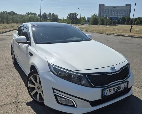 Белый Киа Оптима, объемом двигателя 2 л и пробегом 85 тыс. км за 12200 $, фото 1 на Automoto.ua