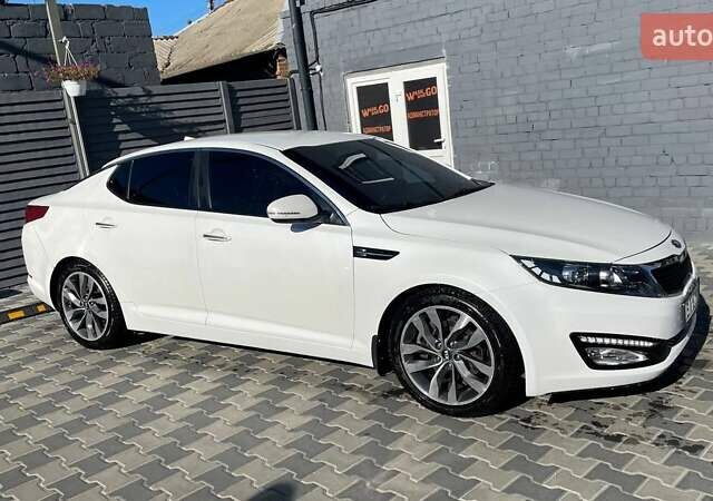 Белый Киа Оптима, объемом двигателя 2 л и пробегом 293 тыс. км за 7900 $, фото 1 на Automoto.ua