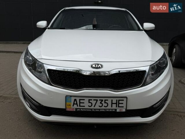 Білий Кіа Оптіма, об'ємом двигуна 2 л та пробігом 85 тис. км за 10700 $, фото 1 на Automoto.ua