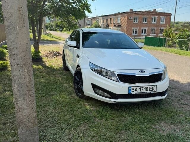 Белый Киа Оптима, объемом двигателя 2 л и пробегом 180 тыс. км за 9000 $, фото 1 на Automoto.ua