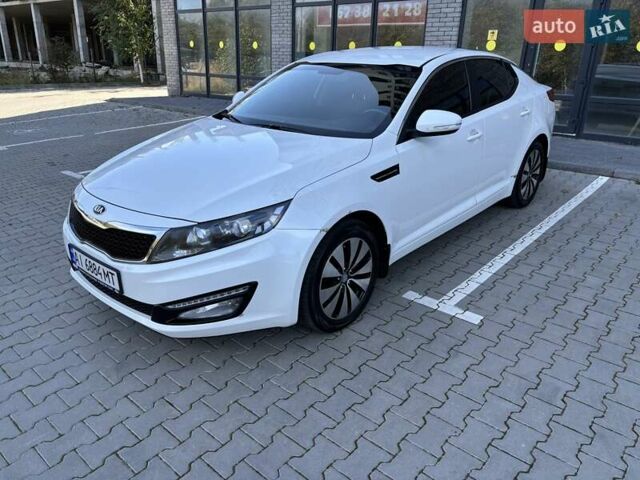Белый Киа Оптима, объемом двигателя 2 л и пробегом 150 тыс. км за 9800 $, фото 1 на Automoto.ua