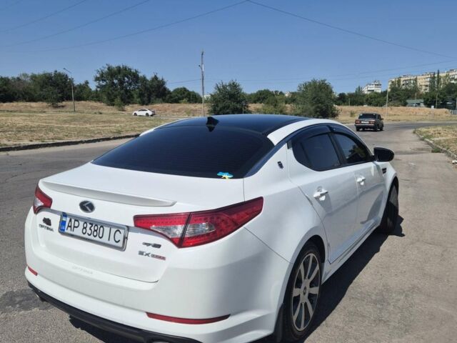 Белый Киа Оптима, объемом двигателя 2 л и пробегом 85 тыс. км за 12200 $, фото 1 на Automoto.ua