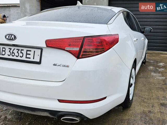 Білий Кіа Оптіма, об'ємом двигуна 2.4 л та пробігом 225 тис. км за 8000 $, фото 1 на Automoto.ua