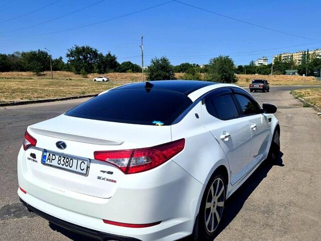 Белый Киа Оптима, объемом двигателя 2 л и пробегом 85 тыс. км за 12500 $, фото 1 на Automoto.ua