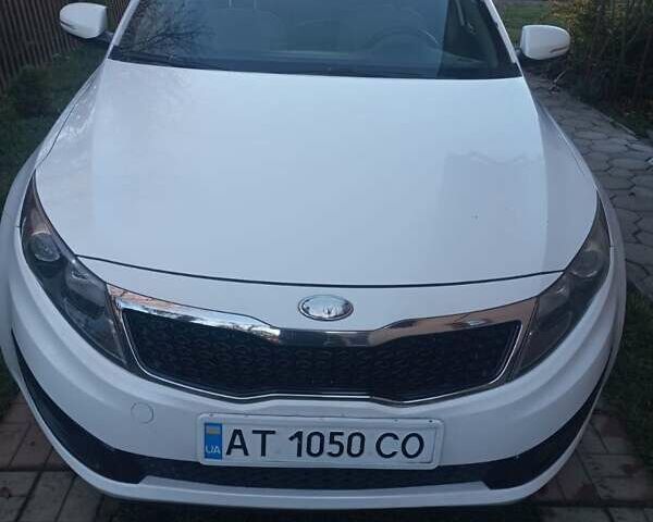 Білий Кіа Оптіма, об'ємом двигуна 2.36 л та пробігом 118 тис. км за 9300 $, фото 1 на Automoto.ua