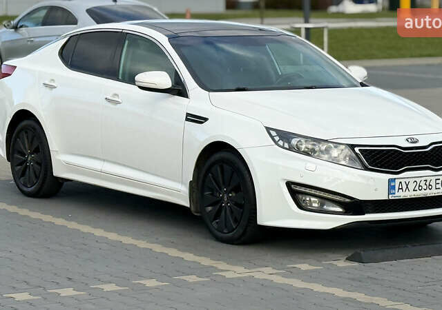 Білий Кіа Оптіма, об'ємом двигуна 2.36 л та пробігом 151 тис. км за 12000 $, фото 1 на Automoto.ua