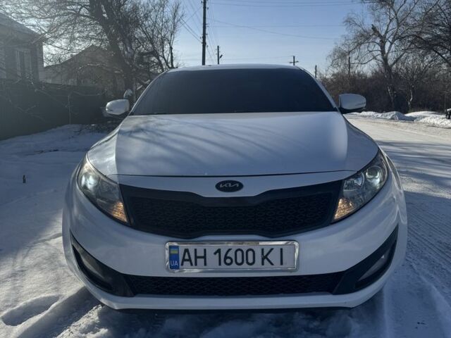 Белый Киа Оптима, объемом двигателя 2.4 л и пробегом 150 тыс. км за 6300 $, фото 1 на Automoto.ua