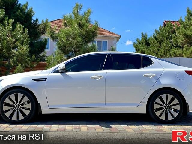 Белый Киа Оптима, объемом двигателя 2.4 л и пробегом 160 тыс. км за 12200 $, фото 1 на Automoto.ua