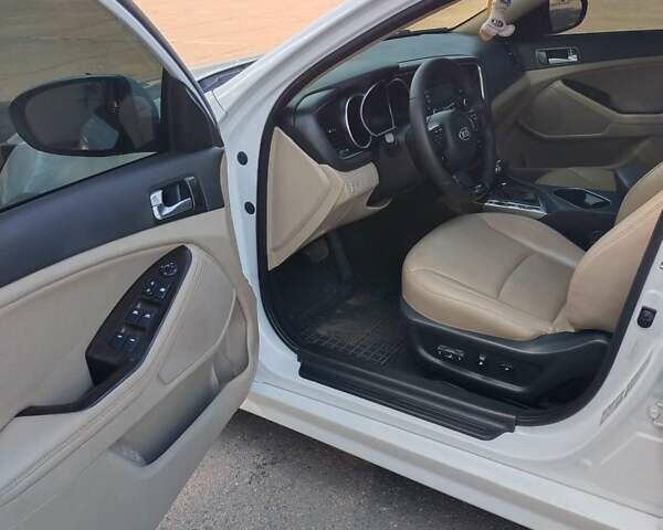 Білий Кіа Оптіма, об'ємом двигуна 2.4 л та пробігом 175 тис. км за 11600 $, фото 1 на Automoto.ua