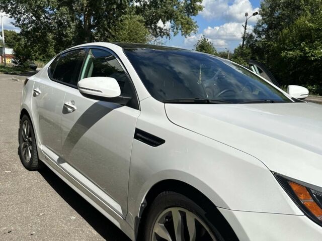 Білий Кіа Оптіма, об'ємом двигуна 2.36 л та пробігом 60 тис. км за 12000 $, фото 1 на Automoto.ua