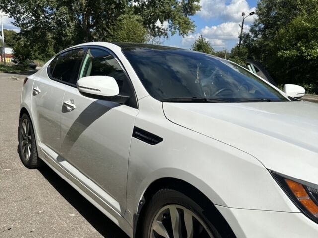 Білий Кіа Оптіма, об'ємом двигуна 2.36 л та пробігом 60 тис. км за 12000 $, фото 1 на Automoto.ua