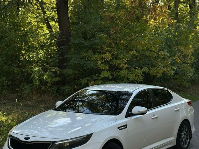 Білий Кіа Оптіма, об'ємом двигуна 2 л та пробігом 258 тис. км за 9000 $, фото 1 на Automoto.ua